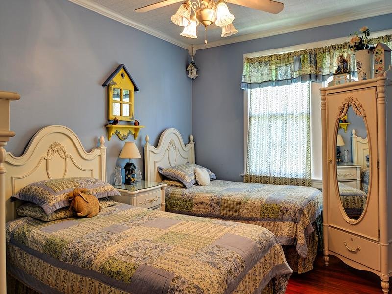 Two twin beds in the second bedroom